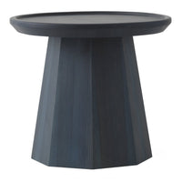 Geometric dark blue accent table with a smooth circular top and textured, faceted base. Perfect for modern decor.