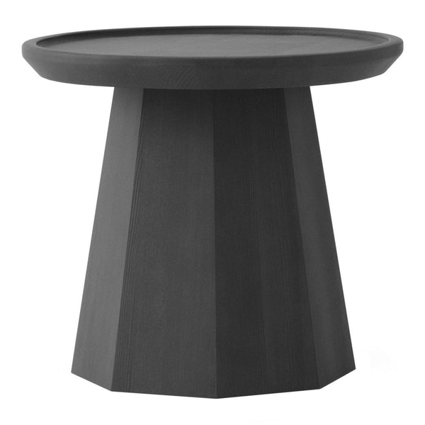 "Solid black geometric side table with a smooth round top and a textured, angular base."