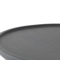 Round, matte black serving tray with a smooth surface and sleek, minimalist design. Perfect for modern decor.