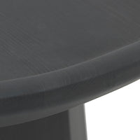 Close-up of a smooth, round table edge in a sleek dark gray finish with subtle wood grain pattern.