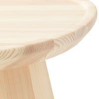 Natural light wood table with smooth, rounded edges and subtle grain patterns. Perfect for a minimalist decor.