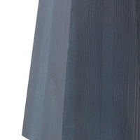 Textured wood pattern in a gradient of deep blue and soft gray tones, showcasing natural wood grain.