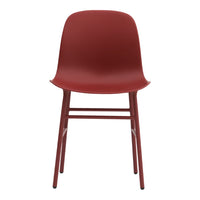 Red plastic chair with minimalistic design and sleek, modern lines. No patterns, just a solid color finish.
