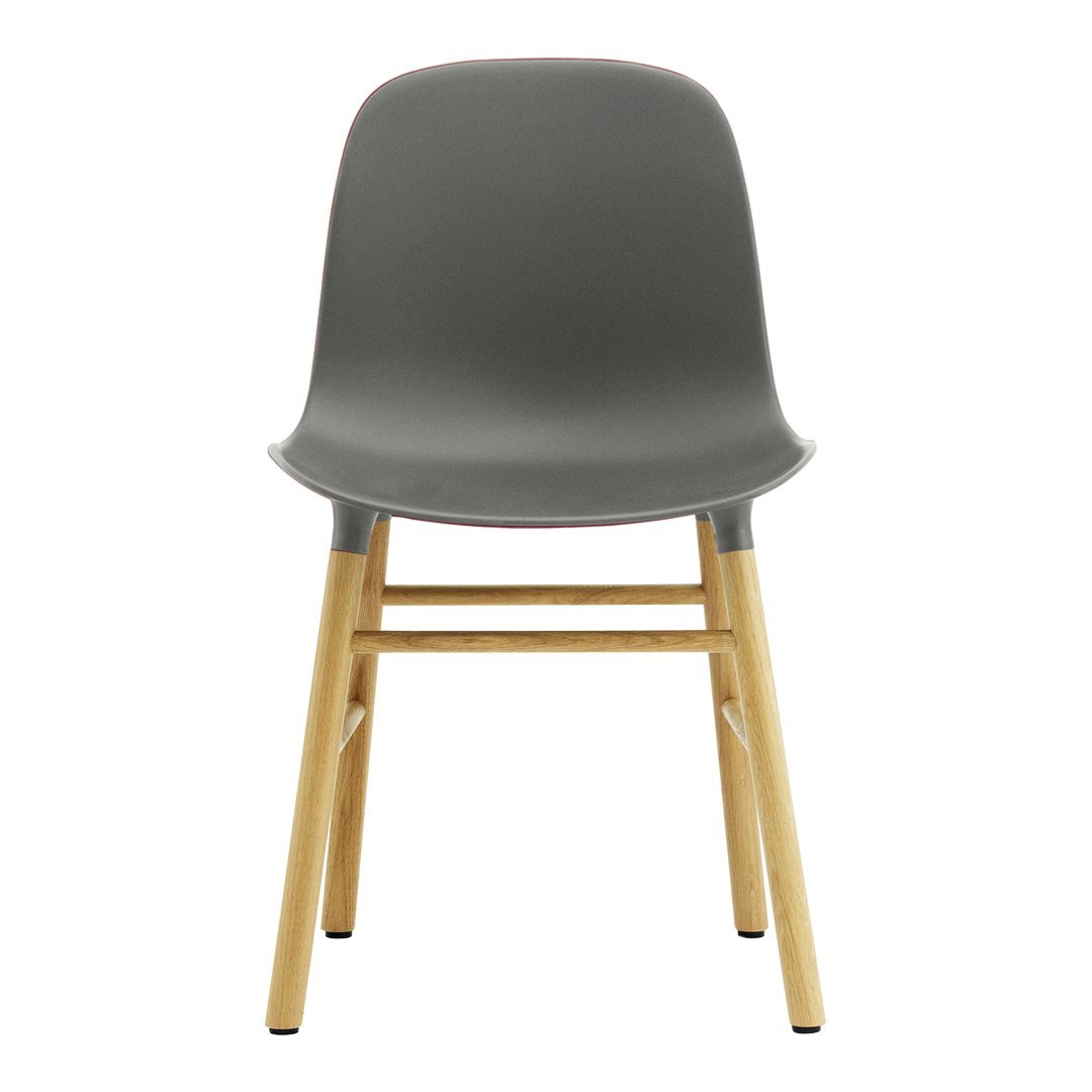 Stylish gray plastic chair with light wood legs, featuring a smooth, modern design. Perfect for contemporary spaces.