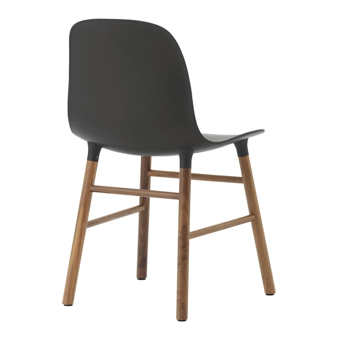 Stylish gray chair with sleek lines and natural wood legs, perfect for modern decor.