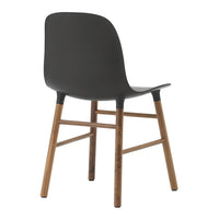 Stylish gray chair with sleek lines and natural wood legs, perfect for modern decor.