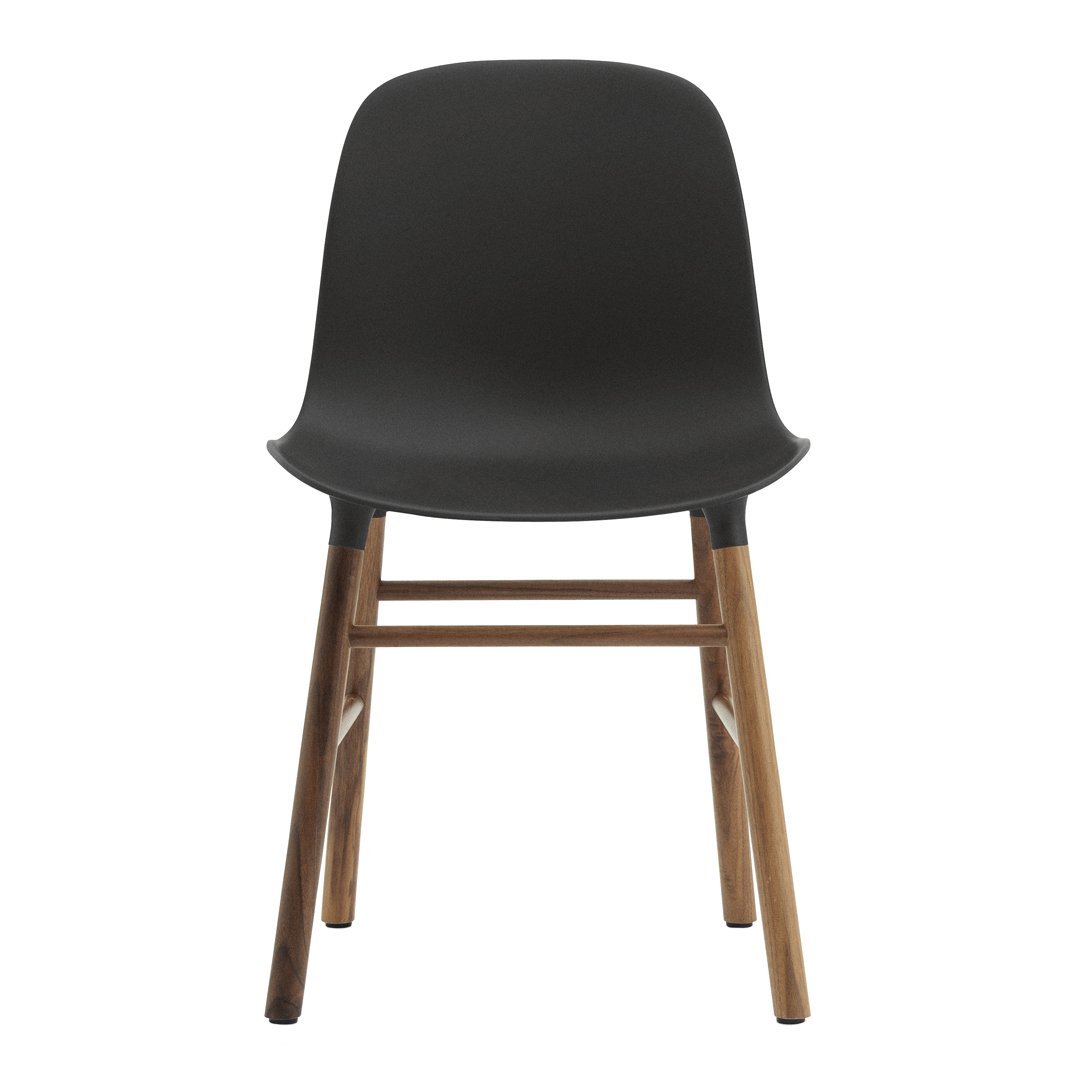 Stylish black chair with a smooth, matte finish and natural wooden legs, perfect for modern decor.