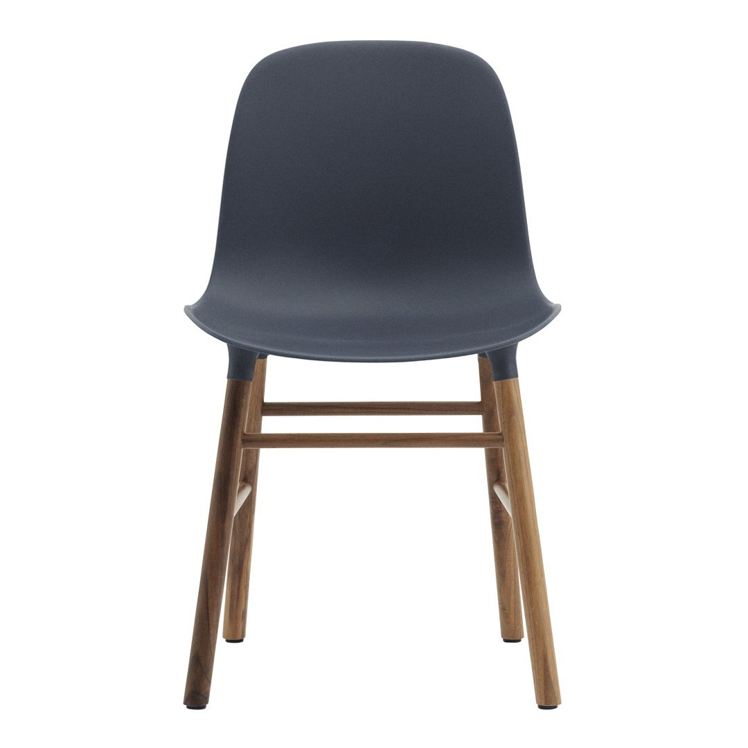Modern gray chair with smooth, curved plastic seat and natural wood legs. Perfect for stylish and minimalist decor.
