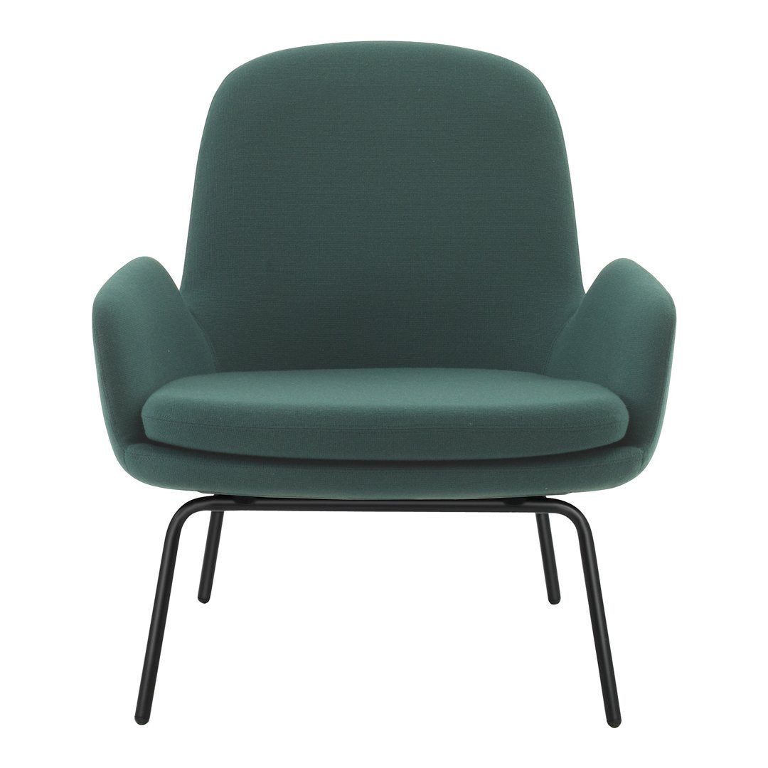 Green upholstered armchair with smooth surface and minimalistic design, featuring a black metal frame. Perfect for modern decor.