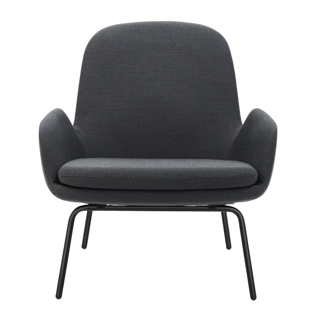 Modern gray lounge chair with smooth fabric and minimalist design, featuring curved backrest and sleek metal legs.