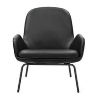 Stylish black leather armchair with smooth, minimalist design and bold, sleek metal legs. Perfect for modern decor.