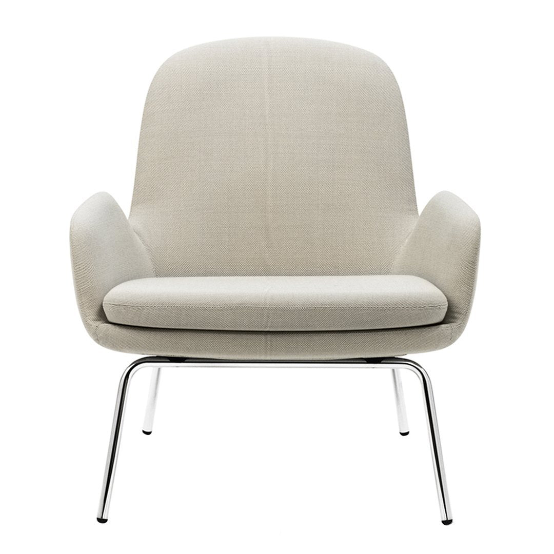 Light beige chair with smooth, rounded lines and a subtle textured pattern, featuring chrome legs for a modern touch.