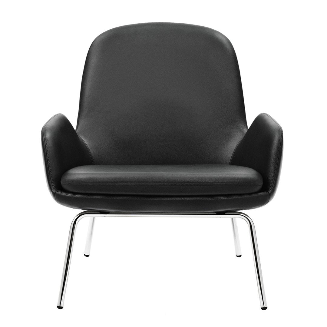 Black leather armchair with sleek chrome legs, featuring a minimalist design and smooth, curved lines.
