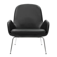 Black leather armchair with sleek chrome legs, featuring a minimalist design and smooth, curved lines.
