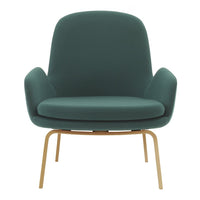 Teal upholstered chair with curved design and gold metal legs, featuring a smooth, minimalist aesthetic.