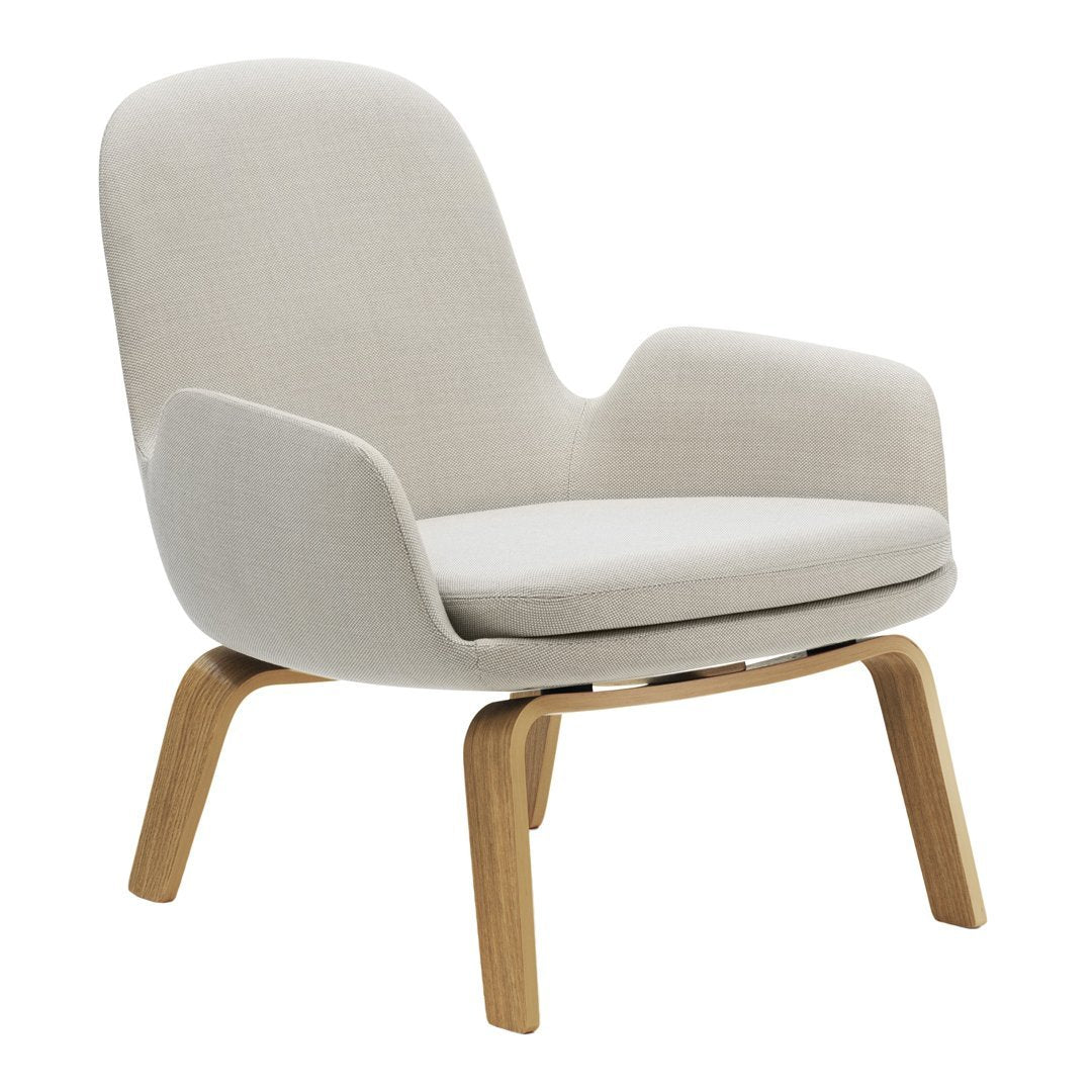 Light beige upholstered chair with smooth contours and natural wood legs, ideal for modern minimalist decor.