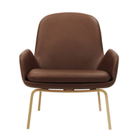 Stylish brown leather chair with a smooth finish and gold metal legs, perfect for modern decor.