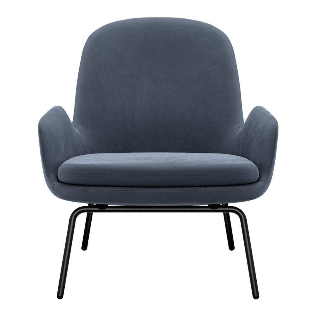 Soft gray upholstered armchair with a smooth, minimalist design and black metal legs. Ideal for modern decor.