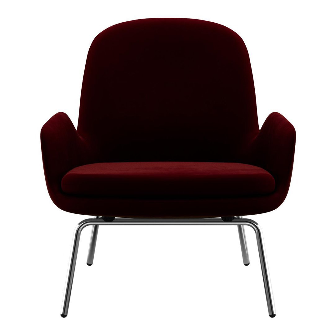 Burgundy velvet chair with sleek chrome legs, featuring a minimalist design and rounded silhouette.