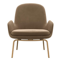Velvet chair in warm beige with smooth, minimalist design and light wooden legs, perfect for modern decor.