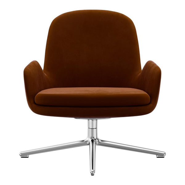 Brown velvet accent chair with a sleek chrome base, featuring a smooth, modern design and plush, rounded shape.