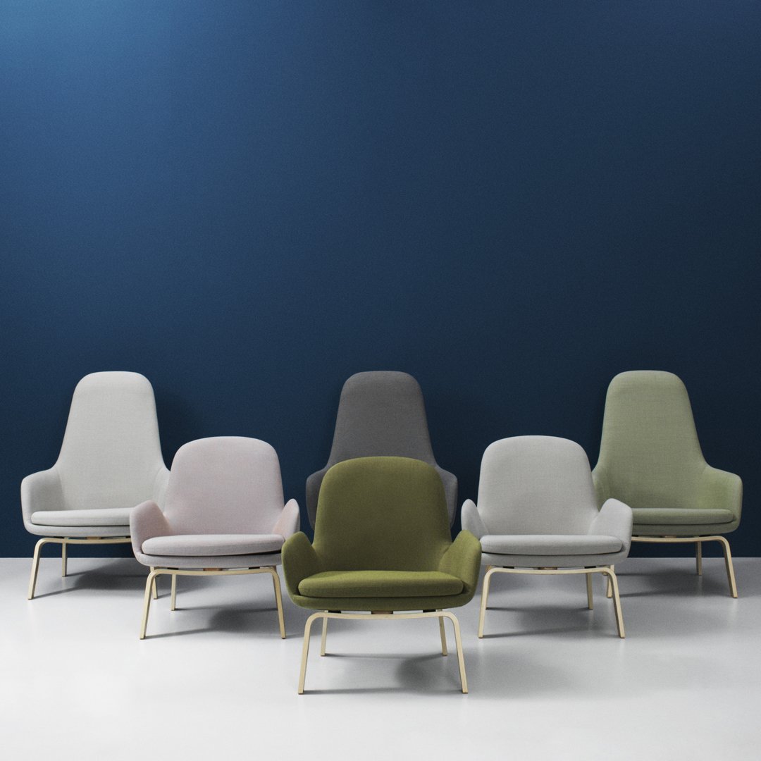 "Six chairs in pastel colors: pink, gray, white, green, and olive green, set against a dark blue background."
