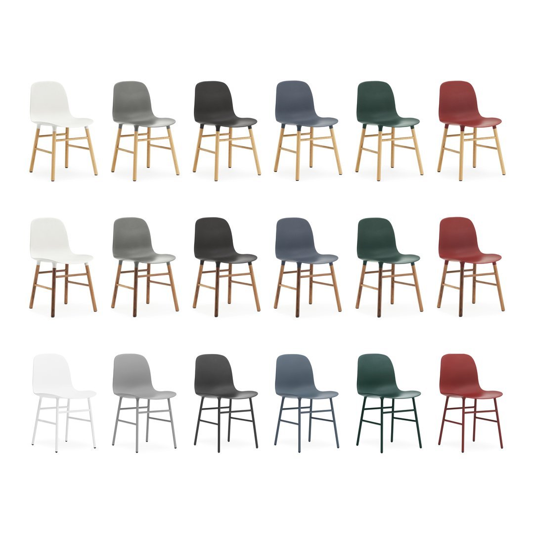 Set of colorful chairs in white, gray, navy, green, and burgundy with wooden legs, showcasing diverse patterns and styles.