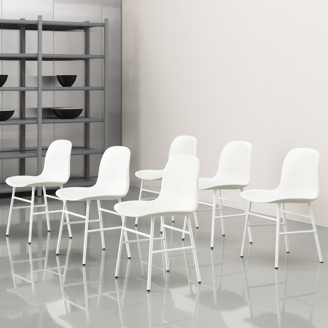 Set of six modern white chairs with sleek lines, standing on a glossy gray floor with minimalist shelving in the background.