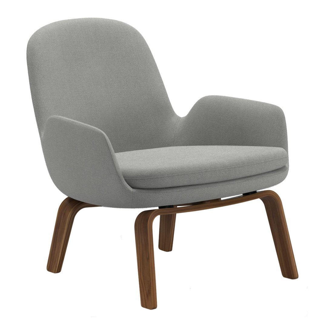 Gray upholstered lounge chair with a smooth, modern design and wooden legs for a stylish touch.