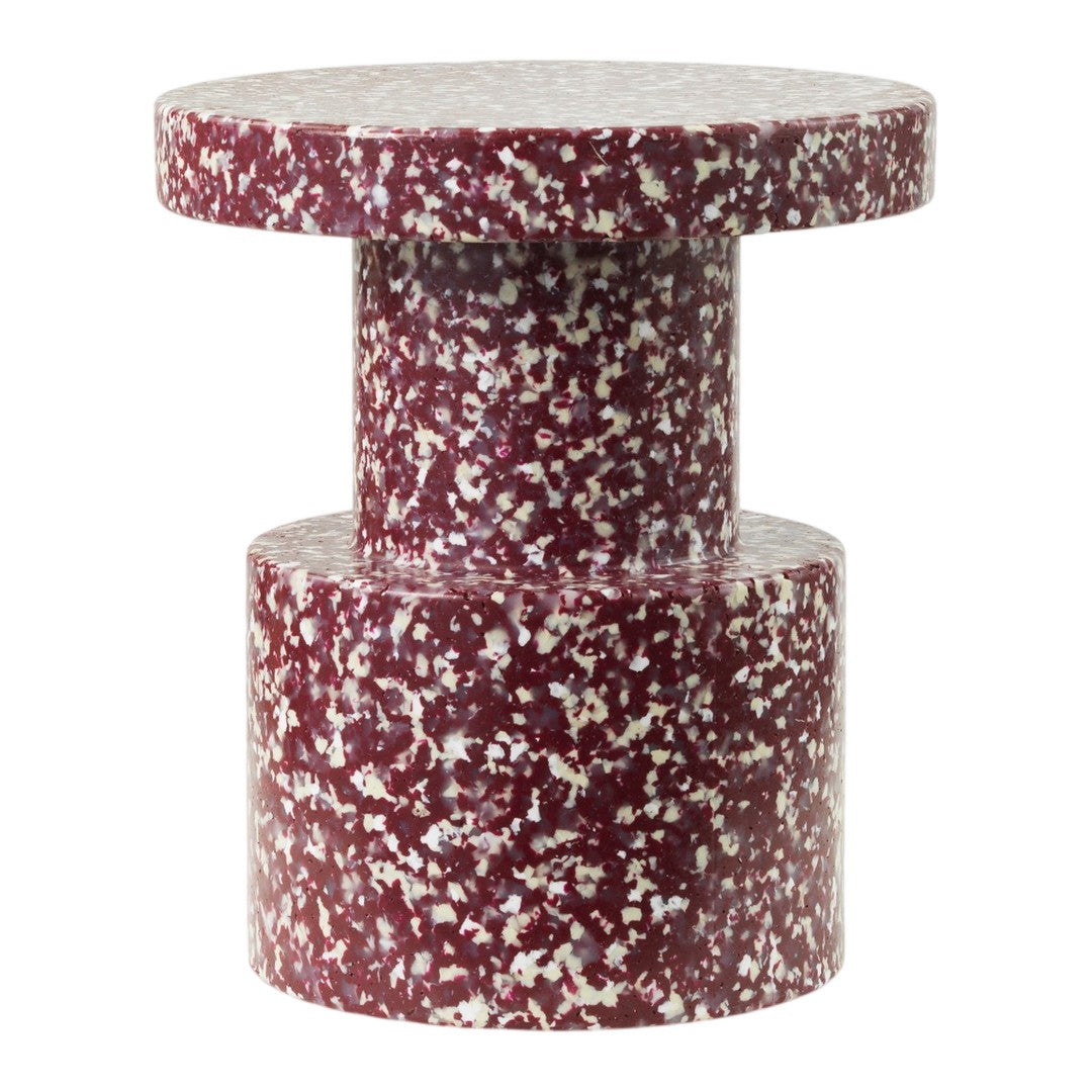 Burgundy and cream speckled side table with a modern, geometric design. Perfect for contemporary decor.