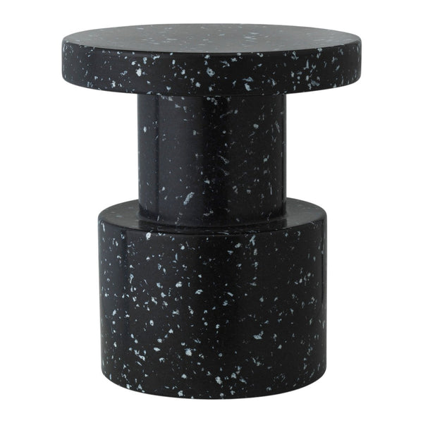 Black speckled accent table with a glossy finish and modern cylindrical design. Perfect for contemporary decor.