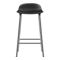 Black bar stool with a smooth, minimalist design and a silver metal frame. Perfect for modern decor.