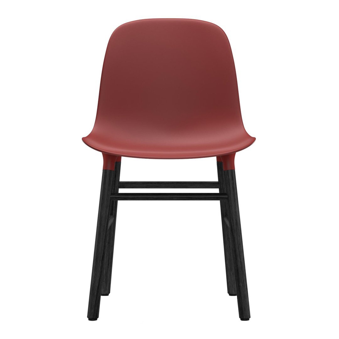Stylish maroon plastic chair with a sleek black wooden frame, perfect for modern decor.