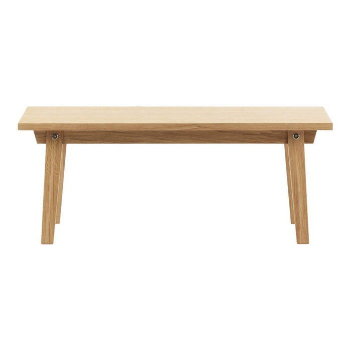 Light natural wood bench with a smooth finish and minimalist design. Simple, earthy tones enhance any decor.