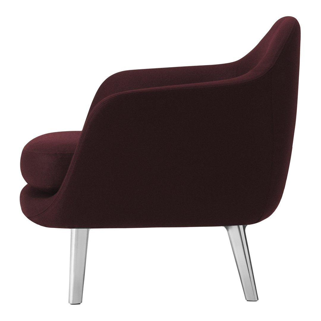  burgundy armchair with smooth upholstery and sleek silver legs, featuring a contemporary design.