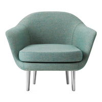 Textured light teal chair with a modern, curved design and silver legs. Ideal for stylish interior decor.