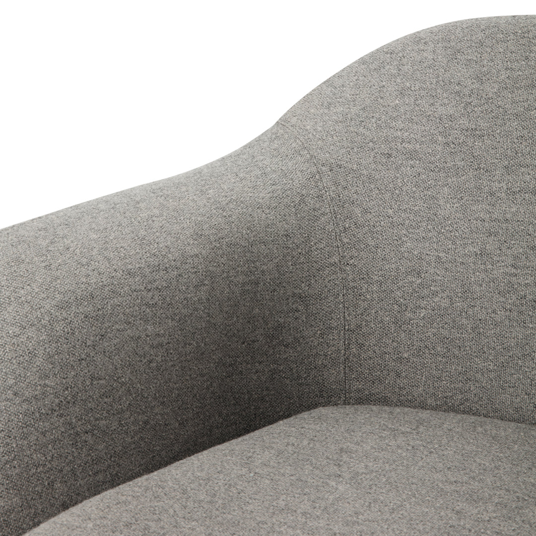 Soft gray fabric upholstery with a subtle texture, perfect for modern decor.