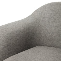 Soft gray fabric upholstery with a subtle texture, perfect for modern decor.
