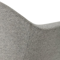 Gray fabric accent chair with a smooth, contemporary pattern and rounded edges. Perfect for modern decor.