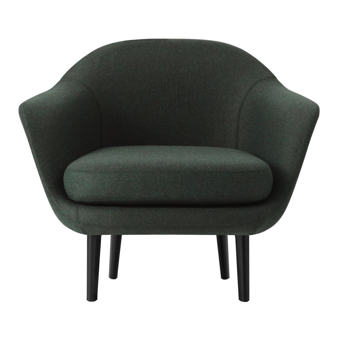 Green upholstered chair with a smooth, curved design and black legs, perfect for modern living spaces.