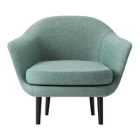 Light teal armchair with soft texture and subtle pattern, featuring black legs for a modern look.