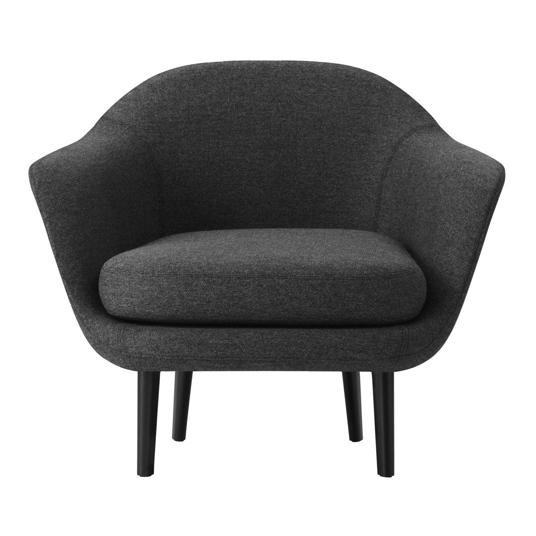 Gray upholstered armchair with a minimalist design and smooth, rounded contours, supported by black wooden legs.