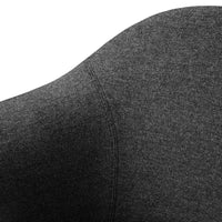 Close-up of textured dark gray fabric with smooth contours and subtle stitching details. Perfect for modern styles.