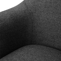 Dark gray textured fabric showcasing a subtle heathered pattern on a modern chair.