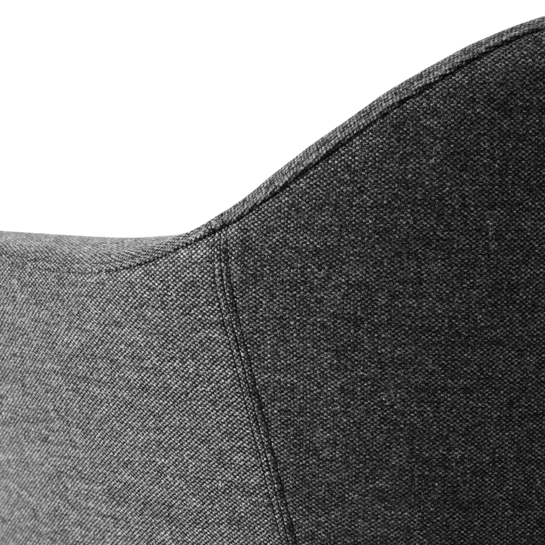 Dark gray textured fabric with a smooth finish and subtle seam detailing for a modern look.