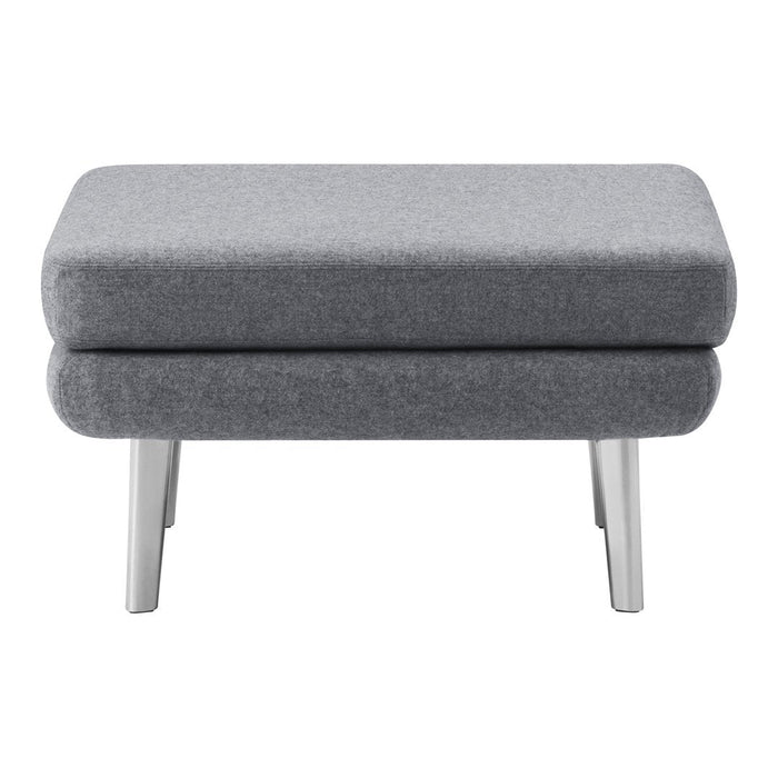 Gray upholstered ottoman with a sleek, minimalist design and silver legs, perfect for modern decor.