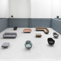 Modern seating collection featuring soft neutrals, muted pastels, and various geometric patterns on fabric.