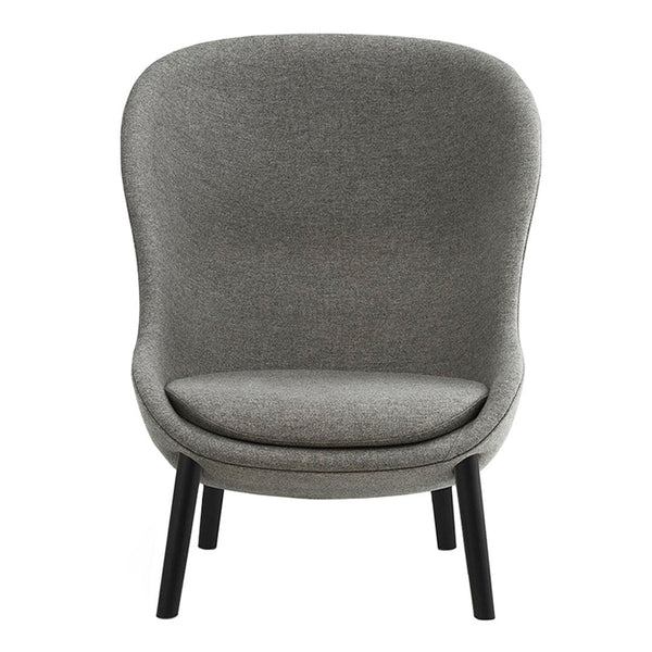 "Stylish gray upholstered accent chair with curved back and black wooden legs, showcasing a sleek, modern design."