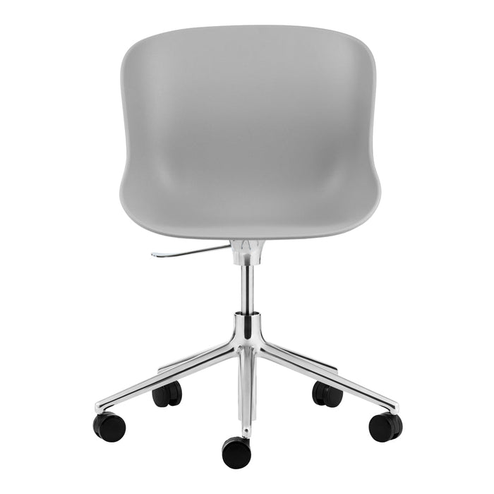 Gray molded chair with a smooth finish and chrome base, featuring five black rolling wheels for easy movement.