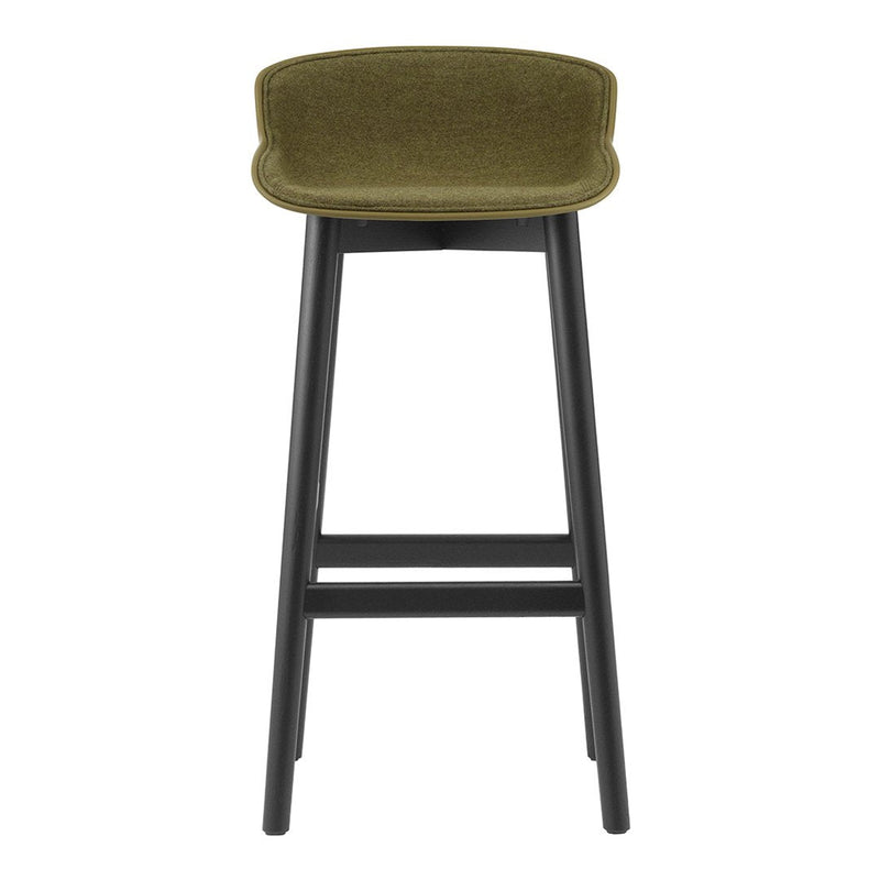 Green upholstered bar stool with a sleek black wooden frame, featuring a smooth, minimalist design.
